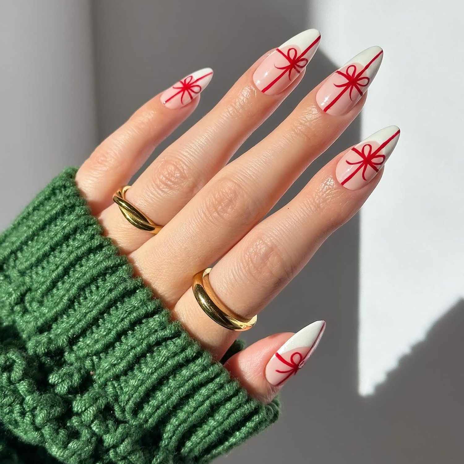 Sheer Pink Stiletto French with Red Bows Sheer Pink Stiletto French with Red Bows β Easy Christmas Nails 2026