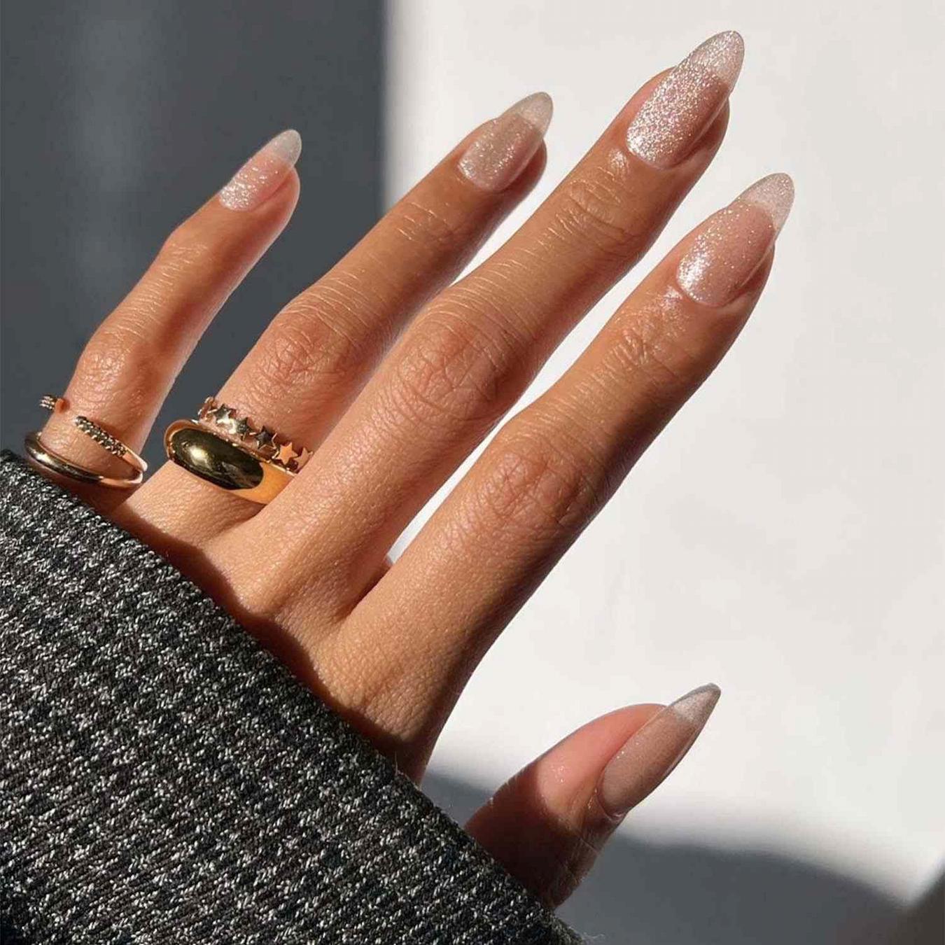 Sheer Nude Glitter Almond Nails Sheer Nude Glitter Almond Nails β New Years Nail Designs 2027