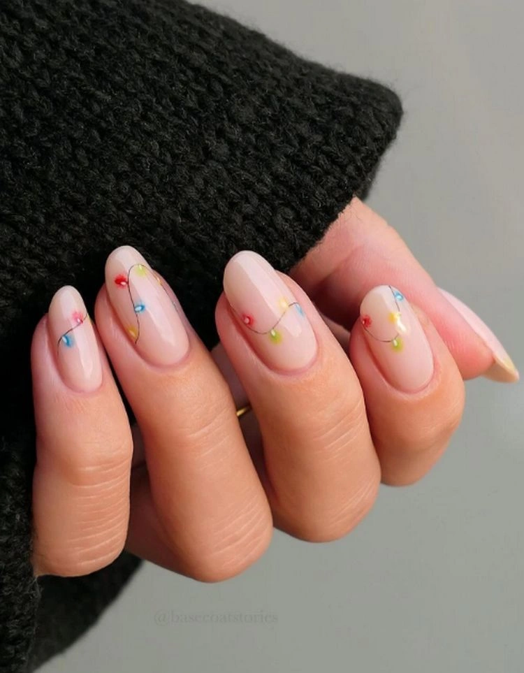 Sheer Pink Christmas Lights Oval Nails Sheer Pink Christmas Lights Oval Nails β Subtle Christmas Nails 2026