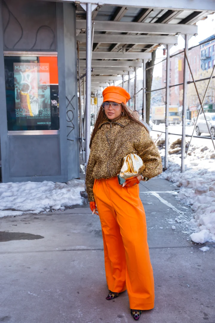 Vibrant Orange Pantsuit with Gold Accents — NYC Winter Outfits