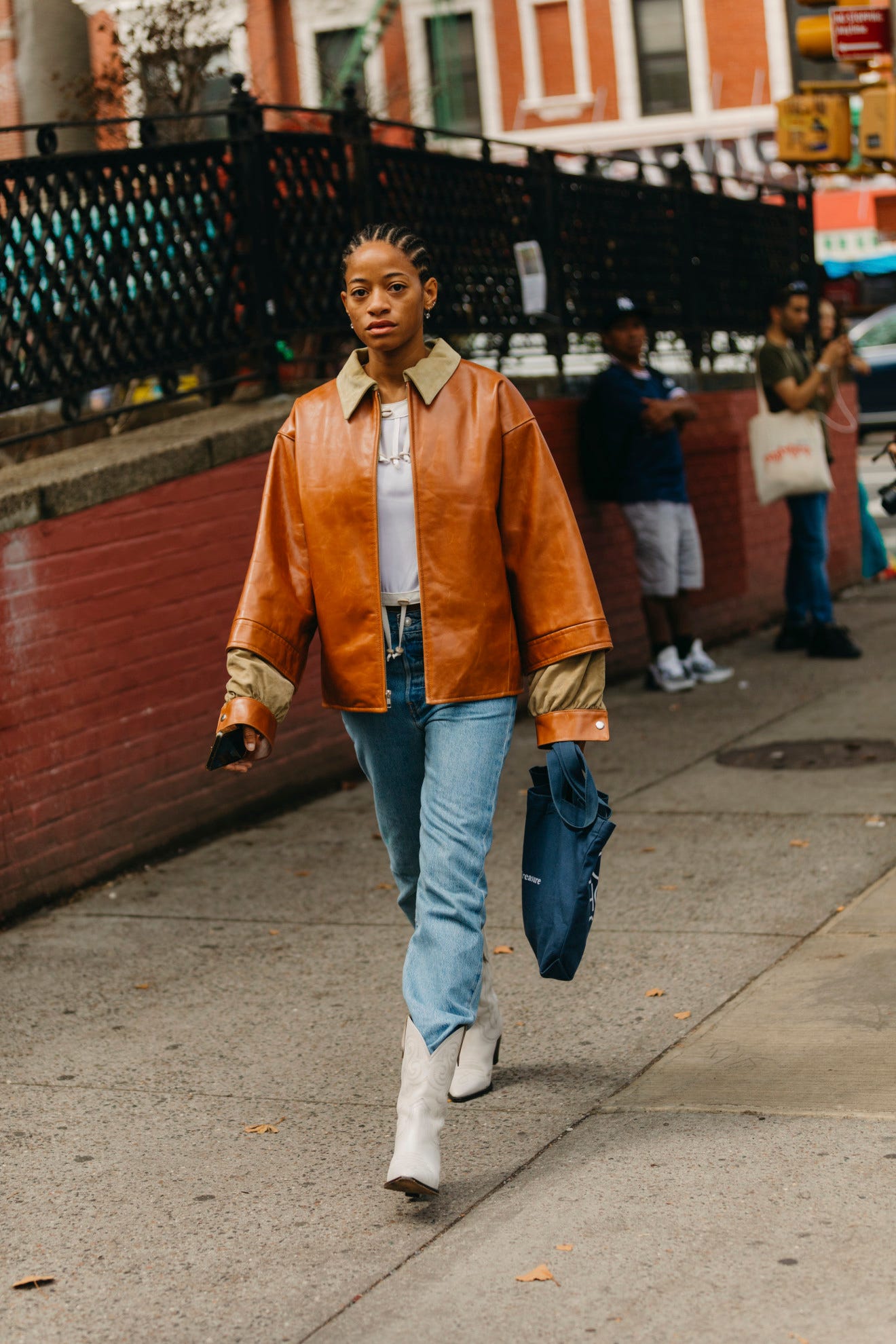White Cowboy Boots with Oversized Jacket for a Casual City Look — Winter Boots Outfits