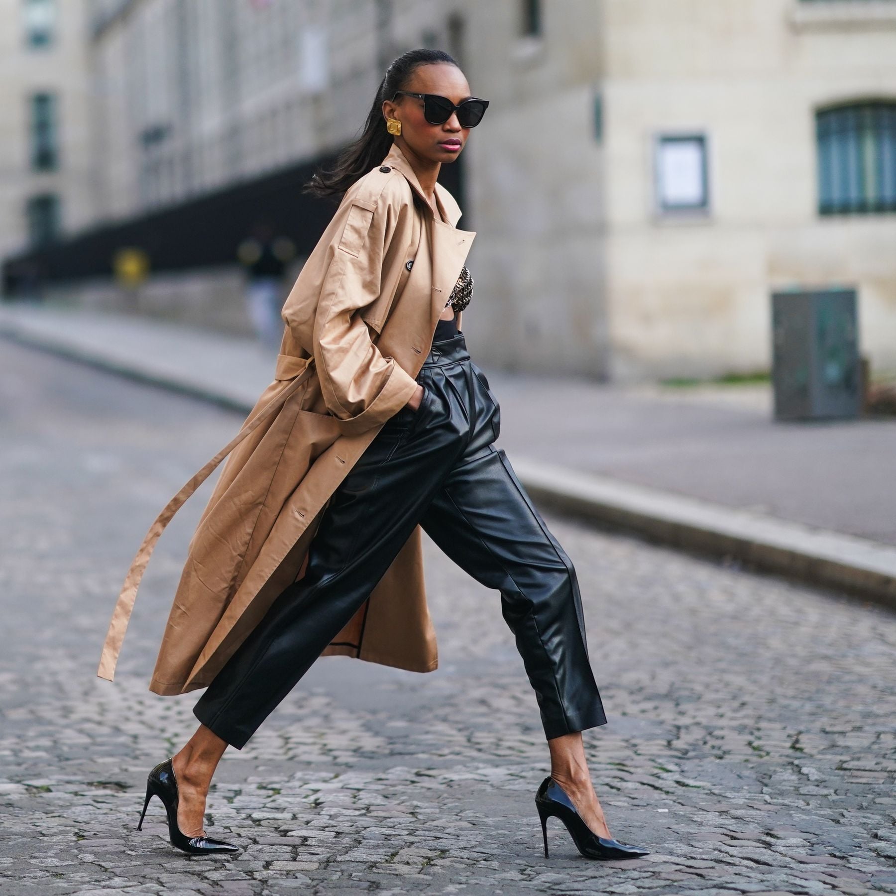 Black Leather Pants with Animal Print Top, Beige Trench Coat, and Pumps — Leather Pants Outfits