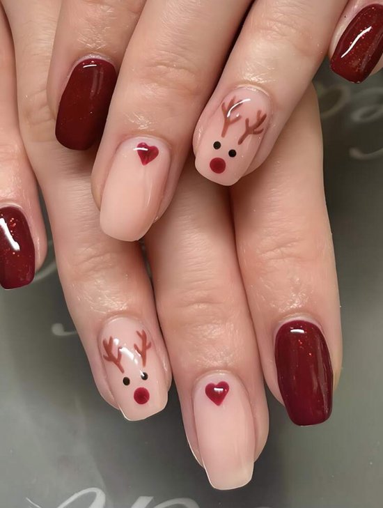 Deep Red and Pink with Hand-Painted Reindeer Faces — Christmas Nails for Kids 2026