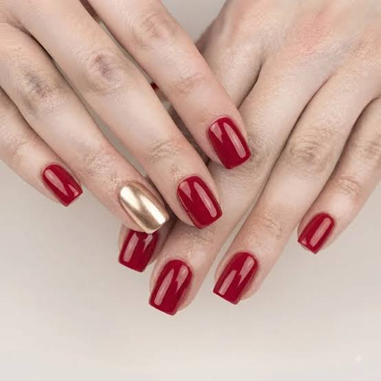 Glossy Red with Gold Chrome Accent Nail Glossy Red with Gold Chrome Accent Nail β Red and Gold Christmas Nails 2026