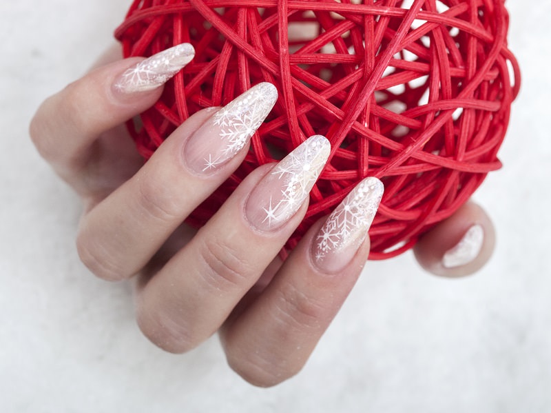 Sheer Nude French Stilettos with Delicate Snowflakes Sheer Nude French Stilettos with Delicate Snowflakes β Snowflake Nails