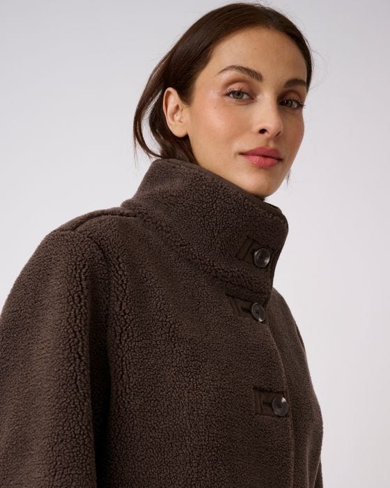 Close-Up Textured Dark Brown Shearling Coat Construction — Shearling Coat Outfits