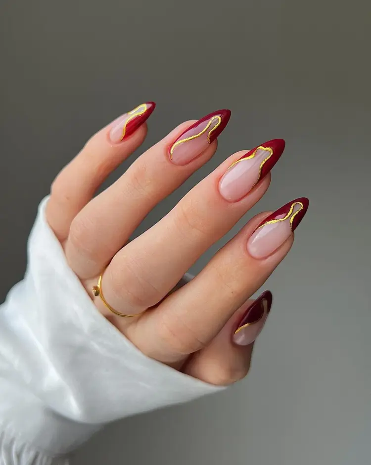 Sheer Nude Base Burgundy Gold Visual Idea Sheer Nude Base Burgundy Gold Visual Idea β Christmas Nail Art 2026