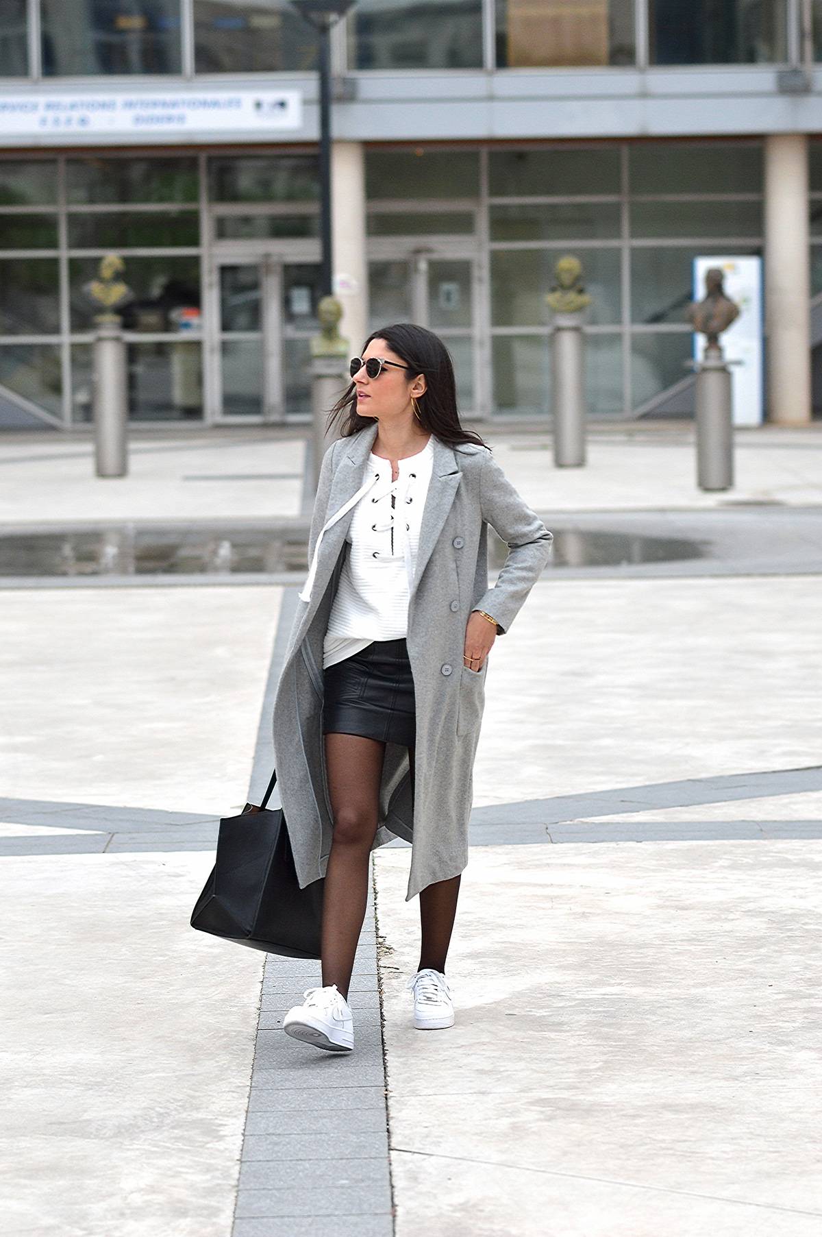 Black Mini Skirt under Grey Coat with Sneakers Black Mini Skirt under Grey Coat with Sneakers β Winter Skirt Outfits
