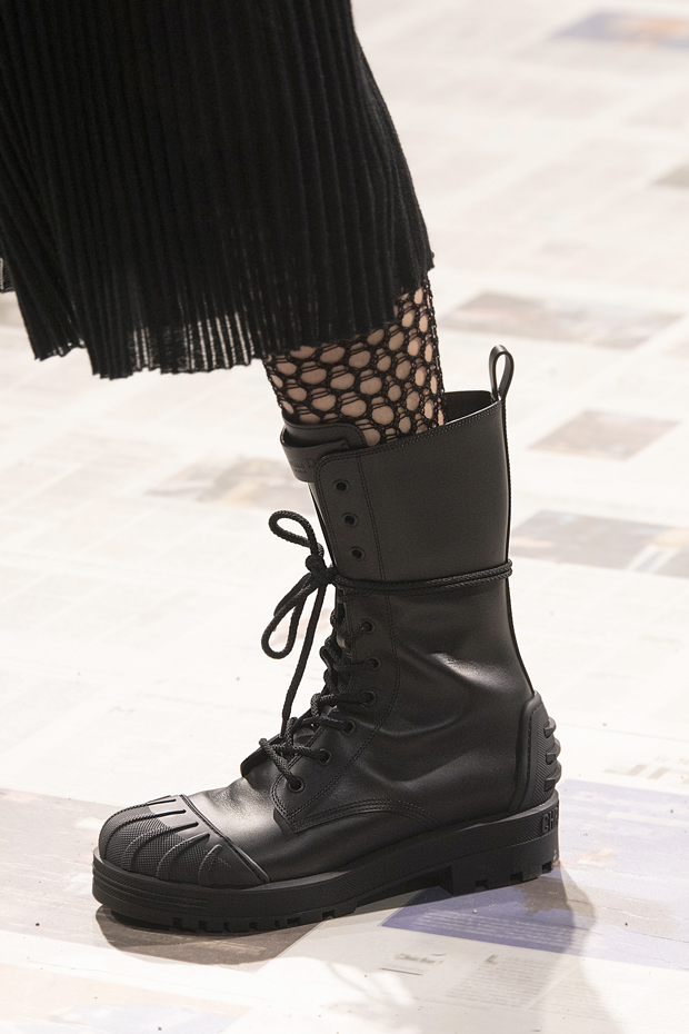 Textural Play: Pleated Skirt and Fishnets — Combat Boots Outfits