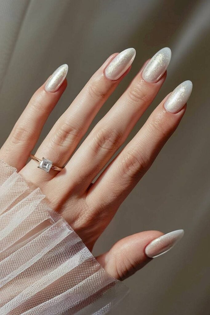 Pale Pearlescent Shimmer Gradient Almond Pale Pearlescent Shimmer Gradient Almond β Winter Wedding Nails