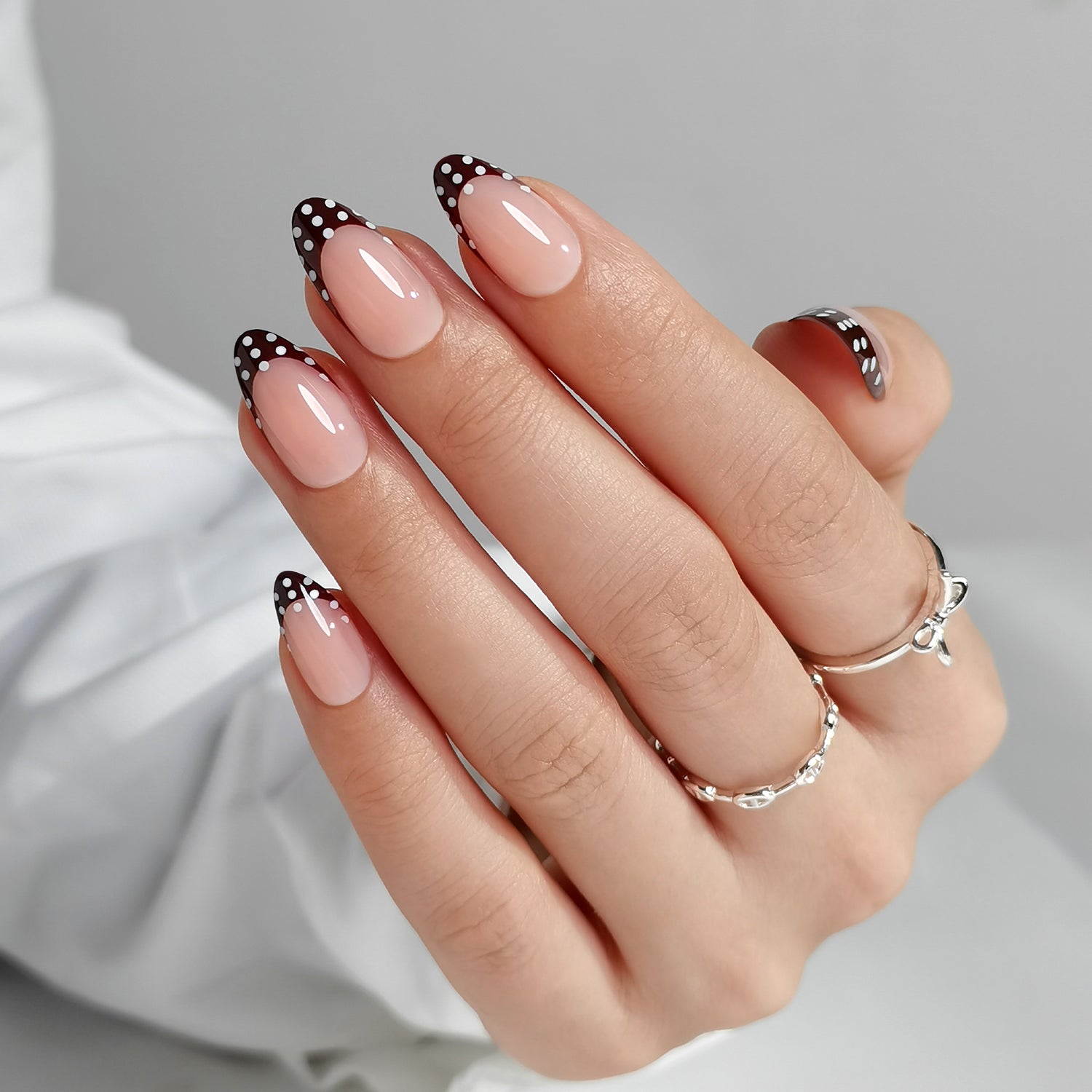 Dark Brown French with White Polka Dots Dark Brown French with White Polka Dots β New Years Almond Nails 2027