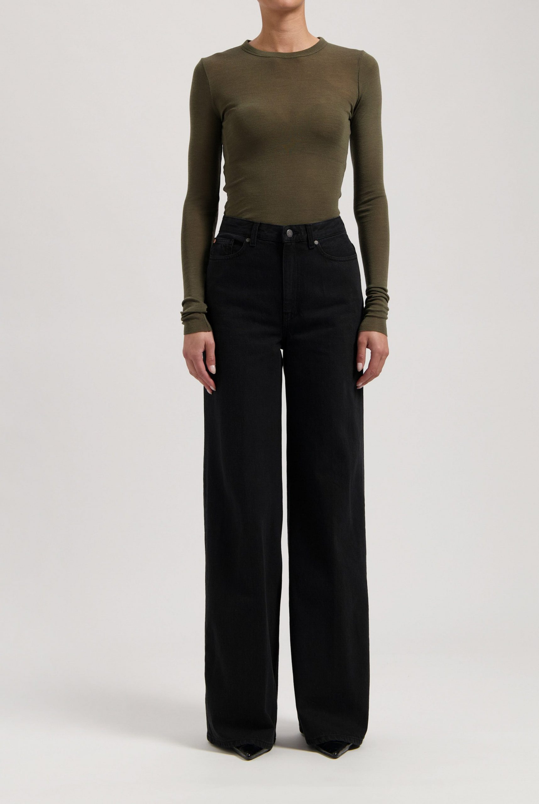 Modern Minimalism: Black Wide Leg Jeans and Olive Top — Winter Outfits with Wide Leg Jeans