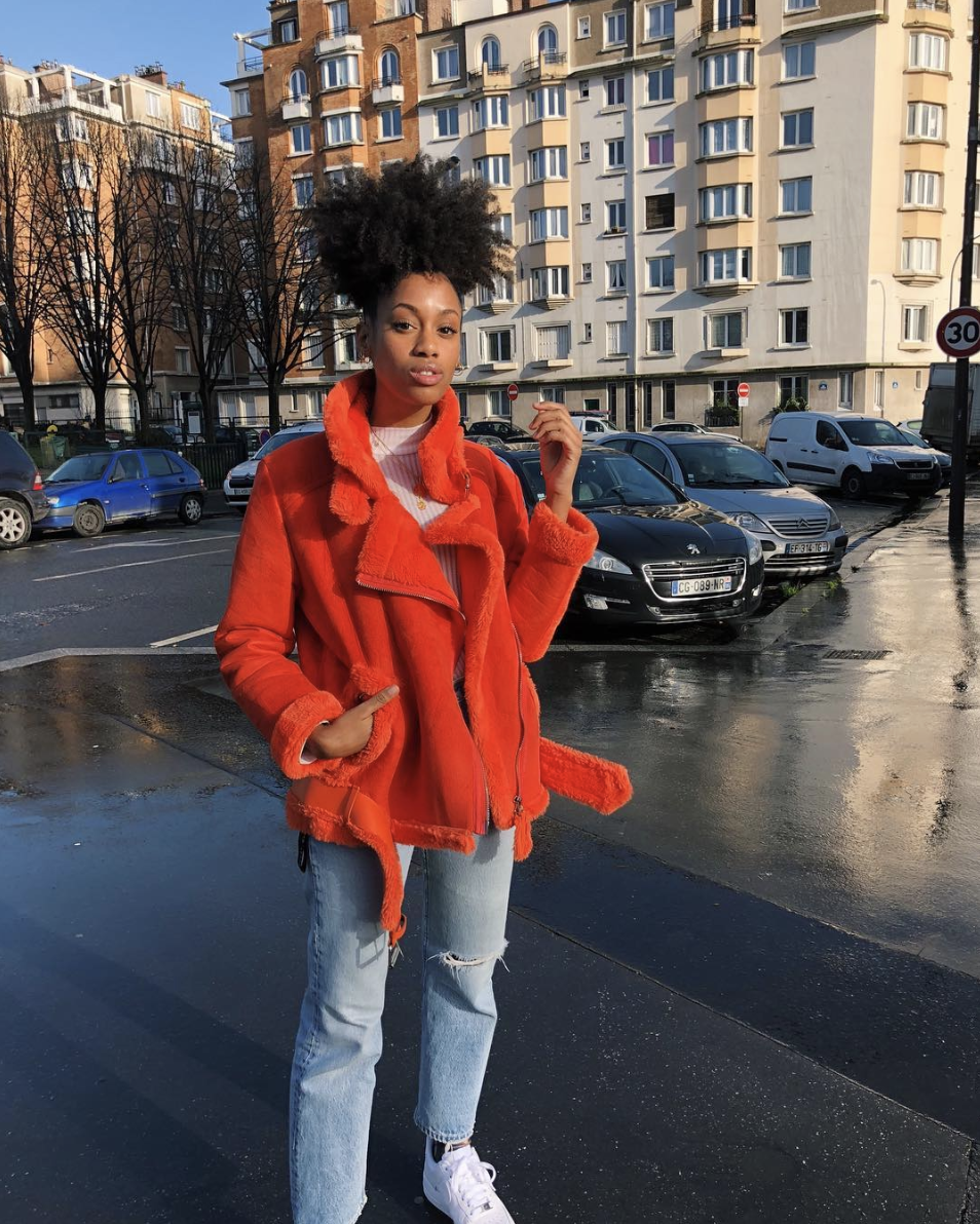 Bright Pop: Orange Faux Fur Jacket with Distressed Denim Bright Pop: Orange Faux Fur Jacket with Distressed Denim β Winter Concert Outfits