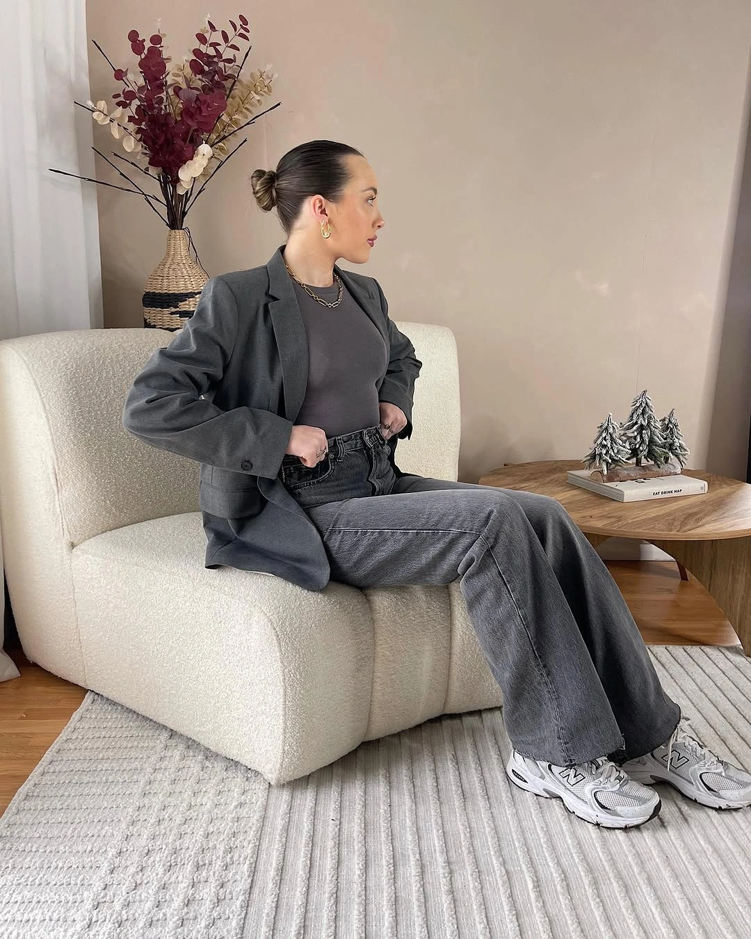 Charcoal oversized blazer, gray wide-leg jeans, dark top, and pale sneakers