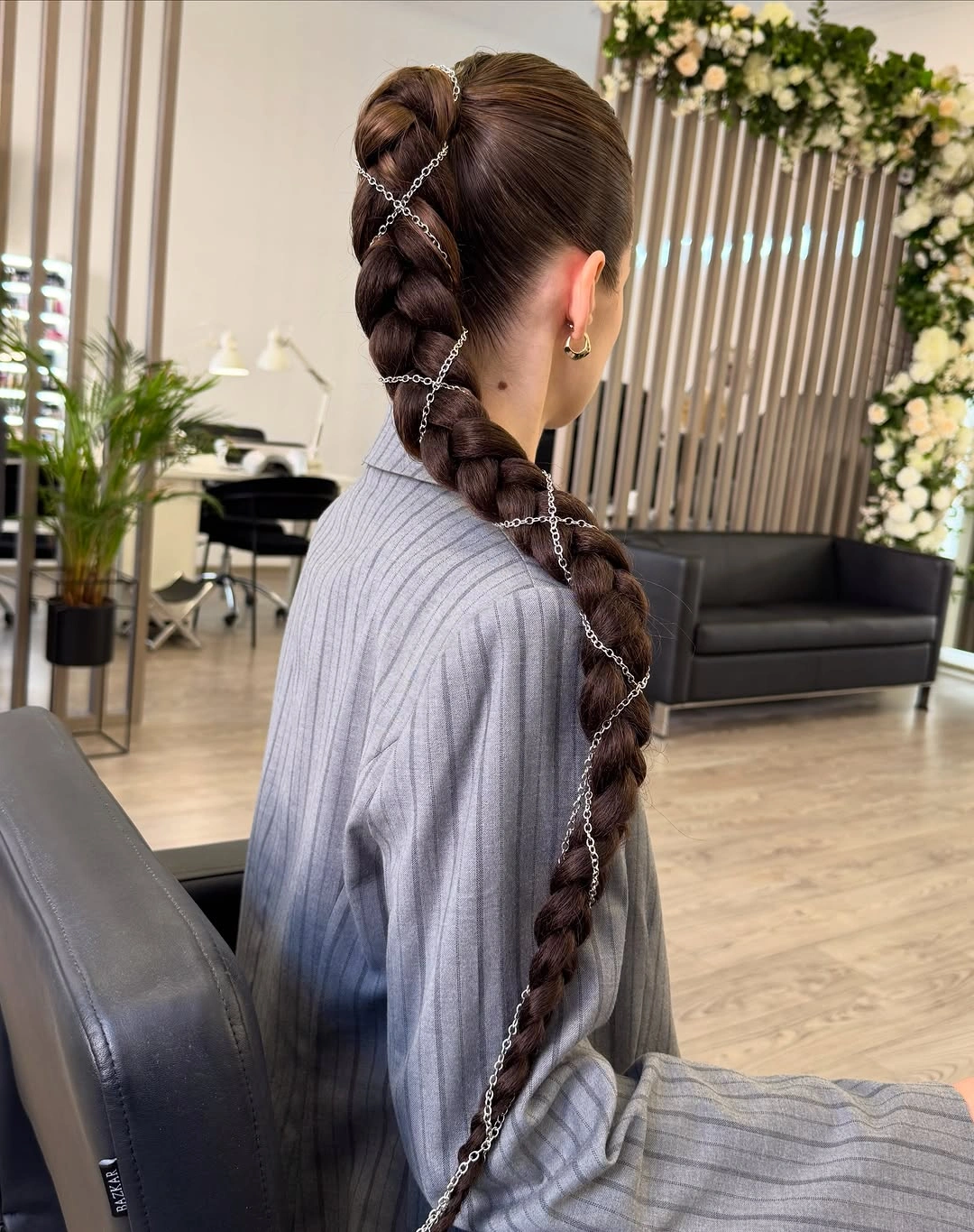 Very long braid wrapped with a chain-like accessory