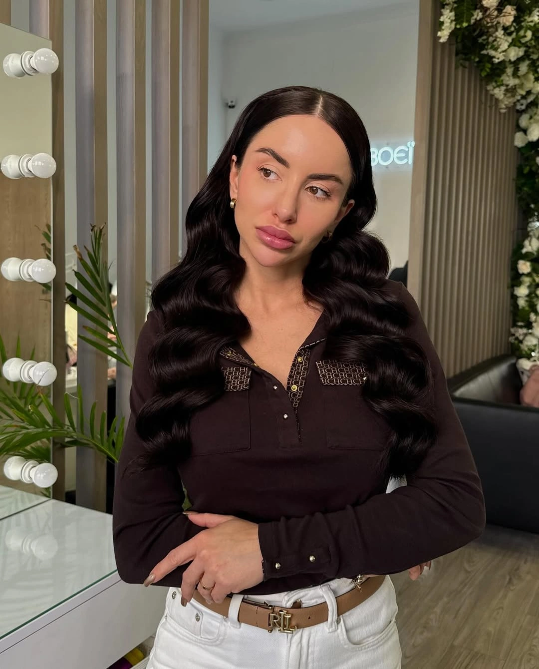 Very long dark hair with large symmetrical waves
