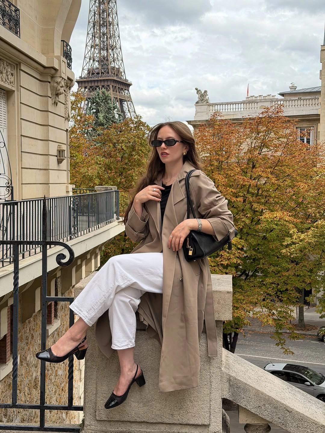 Taupe trench black top white trousers and black heels