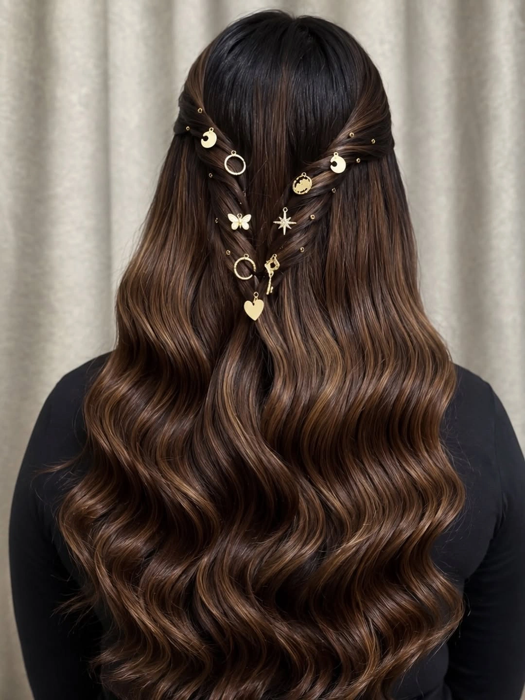 Very long chocolate brown waves with gold celestial ornaments and gathered upper sections