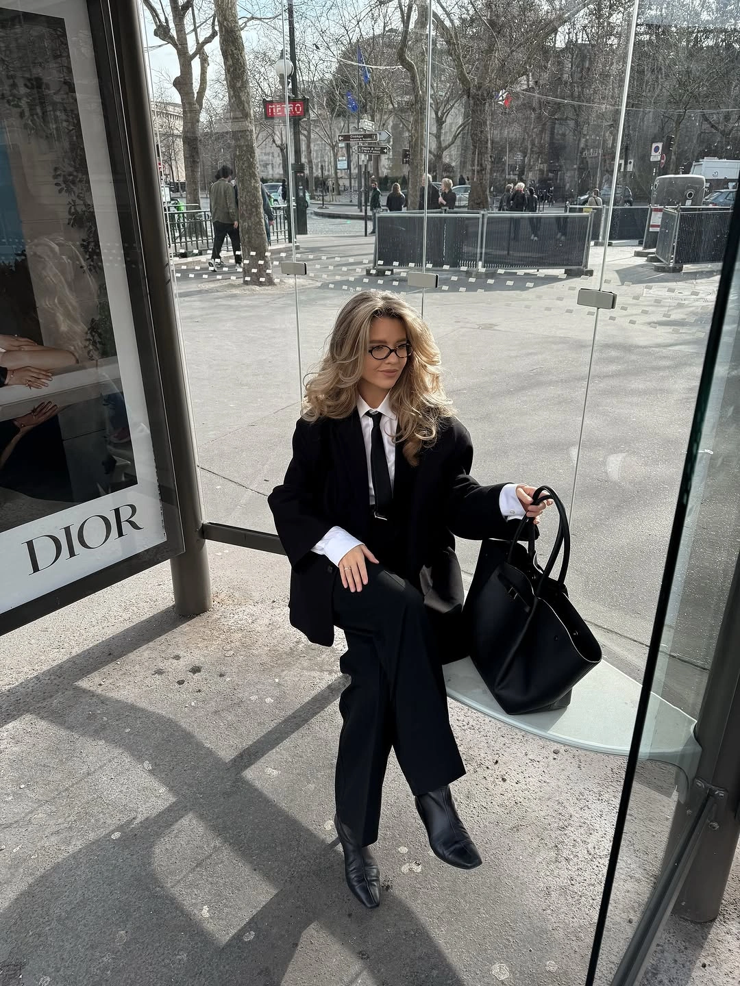 Black blazer and trousers with white shirt and narrow tie
