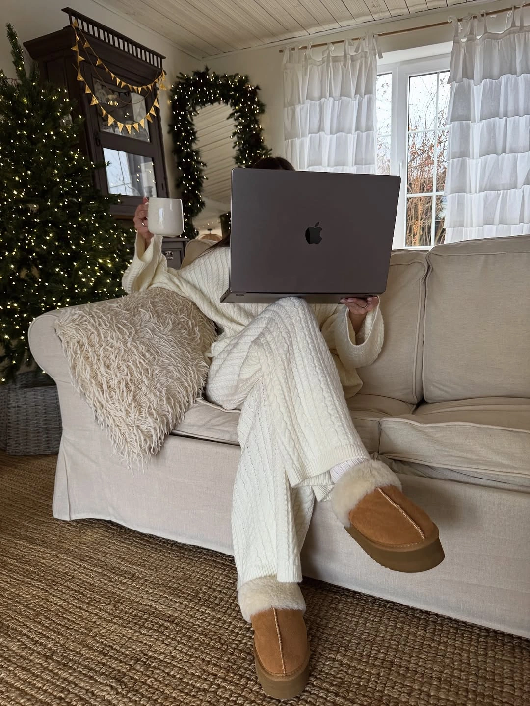 Cream ribbed sweater and matching pants with tan slippers