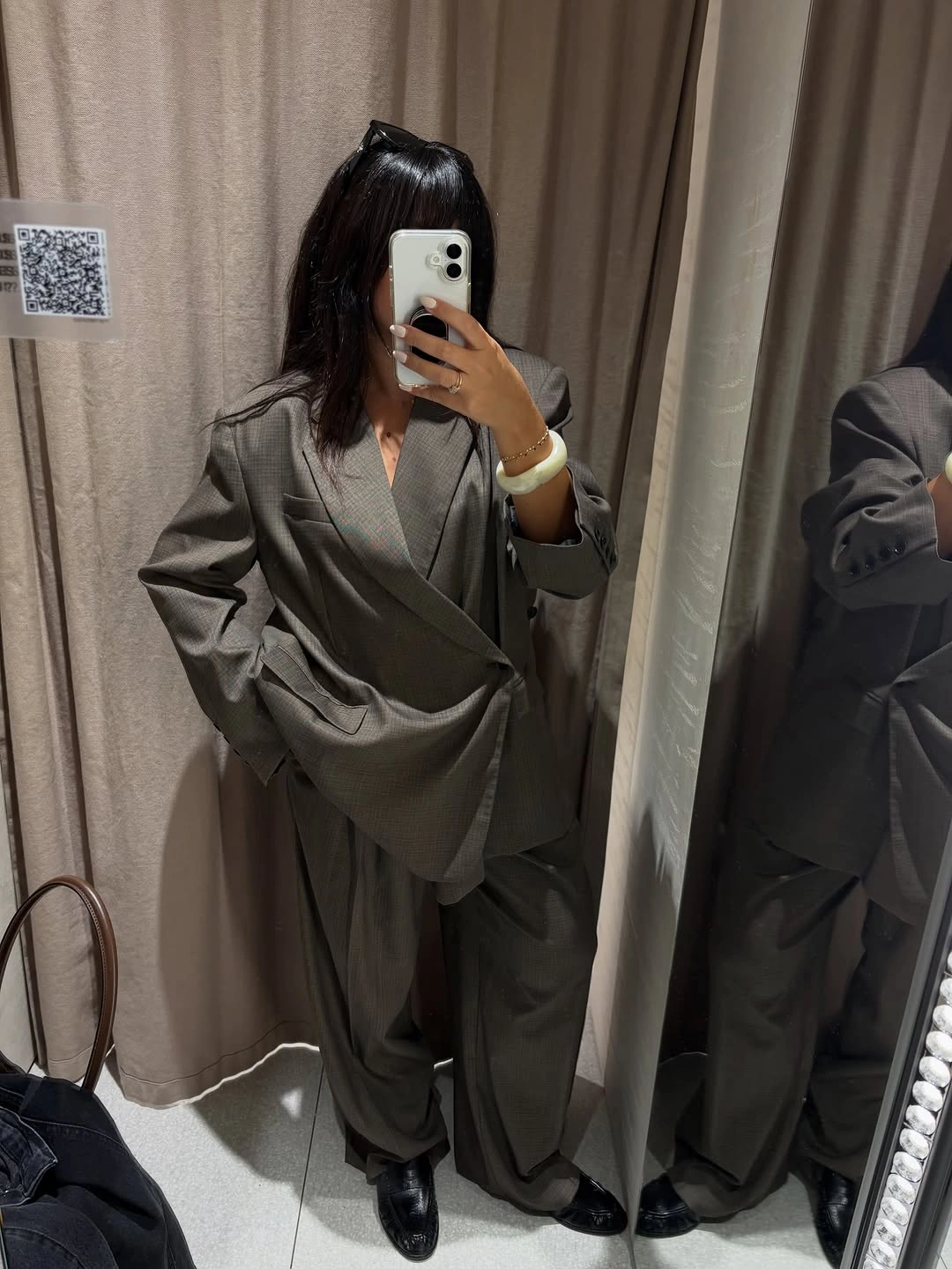 Oversized gray blazer with wide trousers and black loafers